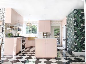 Glamorous Vintage Blush Pink Kitchen. Beverly Hills wallpaper and black and white floors.