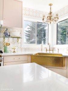 Glamorous Brass gold sink by Thompson Traders and vintage inspired Kingston Brass faucet.