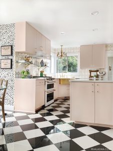 Glamorous Blush kitchen idea with vintage accessories, tiled floors and spotted wall. GE Cafe 30 in. 7.0 cu. ft. Slide-In Double Oven Range in Matte White